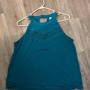 Sleeveless teal blouse